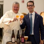 Father Karel Stautemas and Carlsberg CEO Jacob Aarup-Andersen