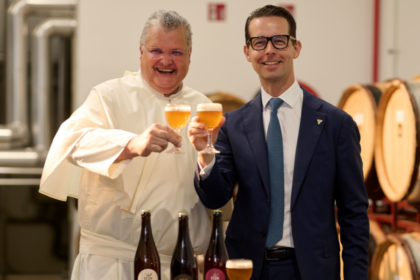 Father Karel Stautemas and Carlsberg CEO Jacob Aarup-Andersen
