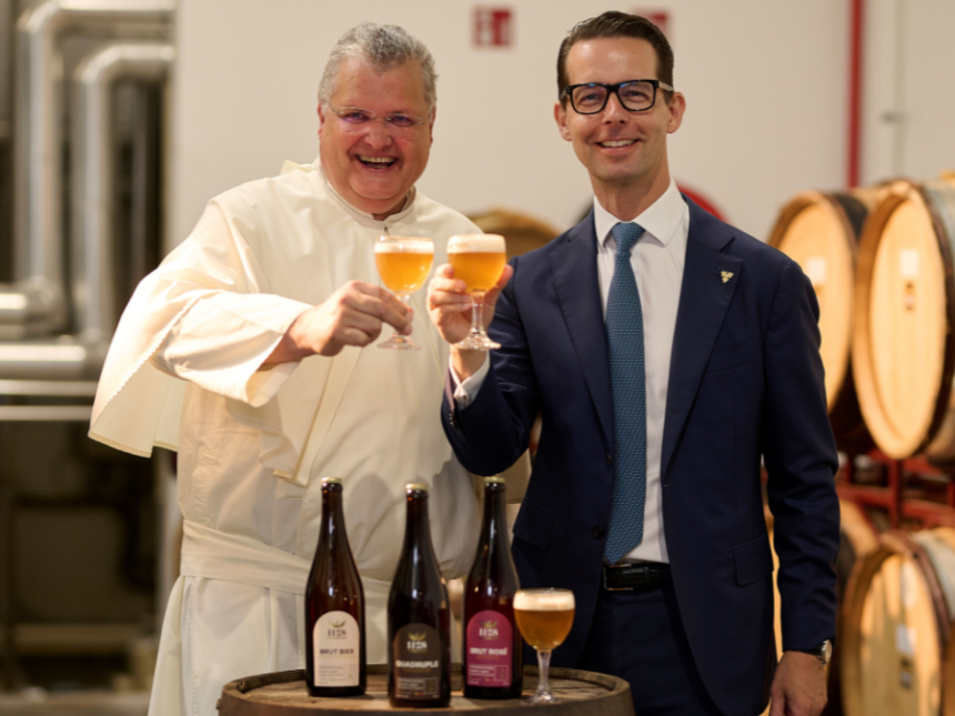 Father Karel Stautemas and Carlsberg CEO Jacob Aarup-Andersen