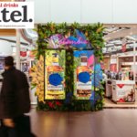 La Hechicera advert on an airport concourse