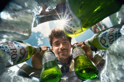 Charles Leclerc with bottles of Peroni 0.0%