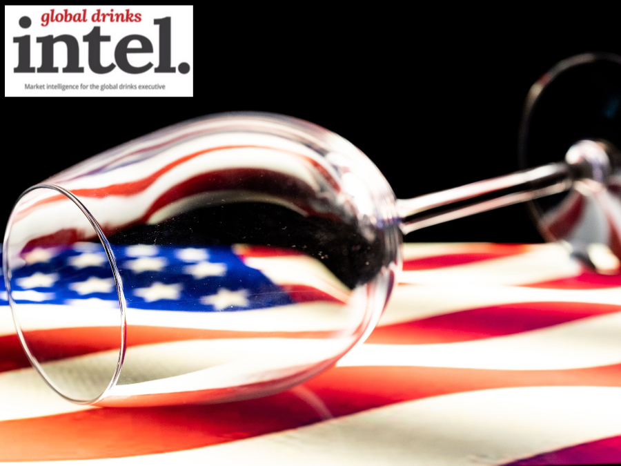 Empty wine glass on top of a US flag
