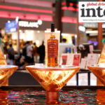 Display in global travel retail of three Bowmore single malt Scotch whiskies