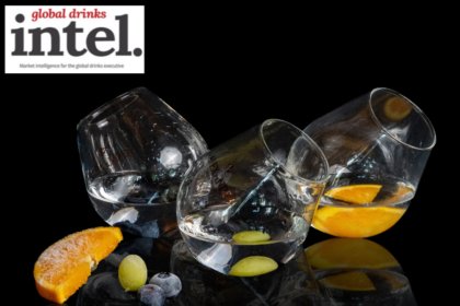 Three serves of Grappa Alex Blanca with pieces of fruit