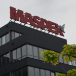 Maspex logo on an office building