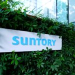 Suntory sign outside office building in Tokyo