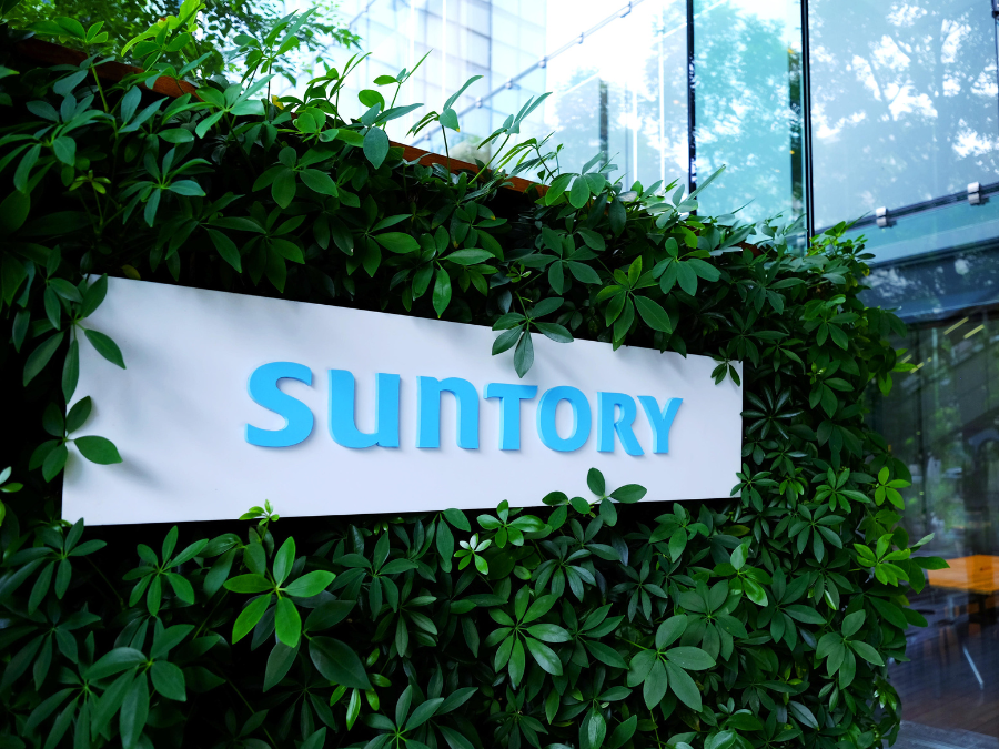 Suntory sign outside office building in Tokyo