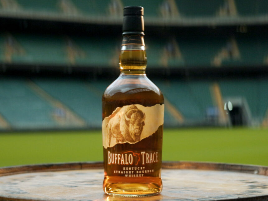 Buffalo Trace bottle with a rugby stadium backdrop