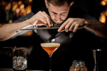 Bartender making a cocktail on a bar
