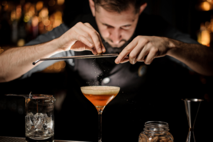 Bartender making a cocktail on a bar