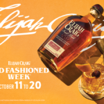 Bottle of Elijah Craig American whiskey with an old fashioned cocktail serve