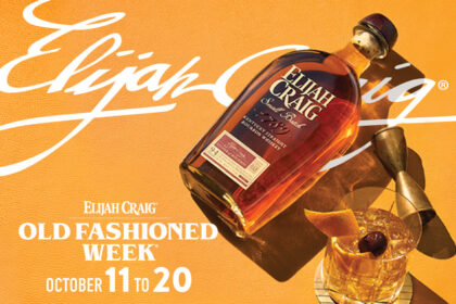 Bottle of Elijah Craig American whiskey with an old fashioned cocktail serve