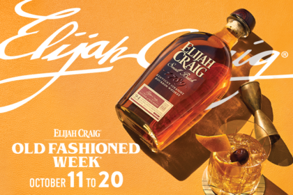 Bottle of Elijah Craig American whiskey with an old fashioned cocktail serve