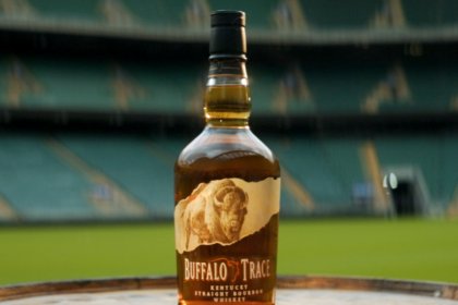 Buffalo Trace bottle with a rugby stadium backdrop