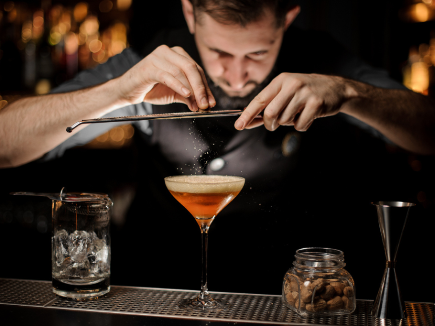 Bartender making a cocktail on a bar