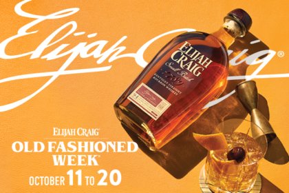 Bottle of Elijah Craig American whiskey with an old fashioned cocktail serve