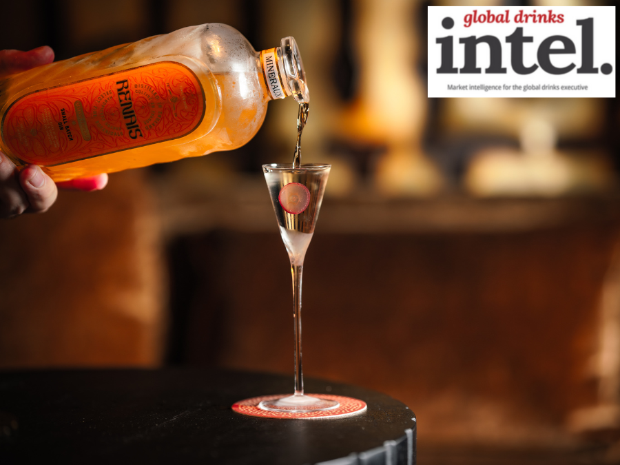 Bottle of Renais gin being poured into an elegant shot glass