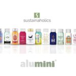 Sustainaholics logo with row of 5cl 100% recycled aluminium bottles containing spirits