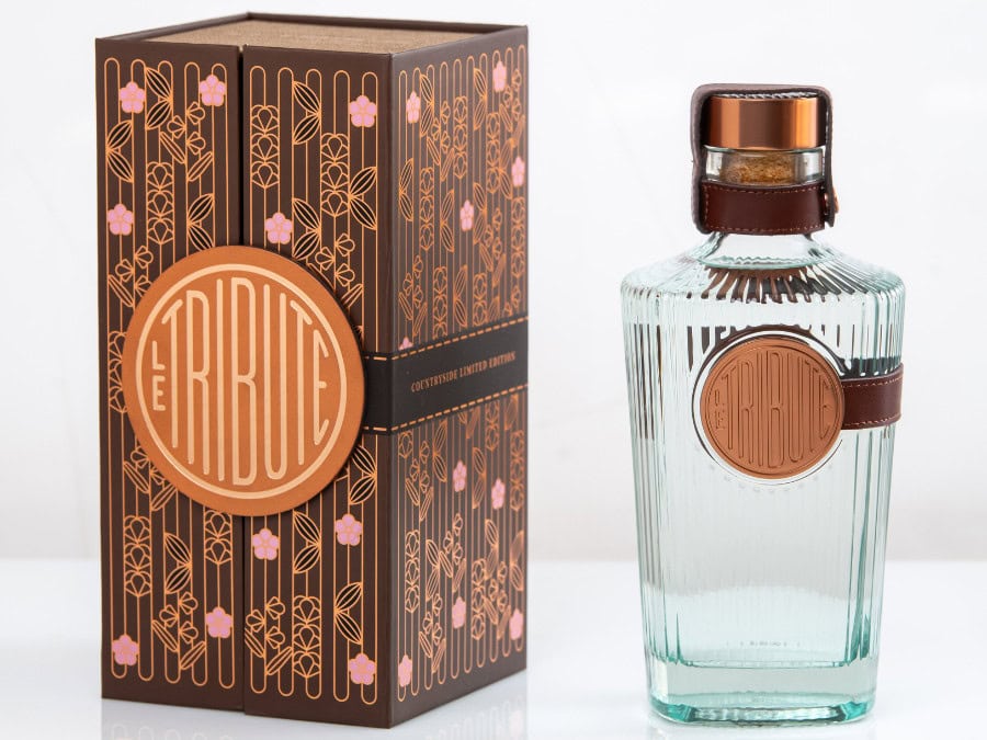Bottle of and box for Le Tribute gin