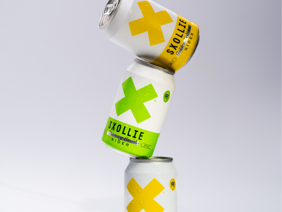 Three cans of SXOLLIE Cider
