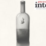 Image of a person falling inside a half-empty bottle