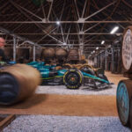 An Aston Martin Formula One car inside Glenfiddich warehouse