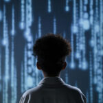 A child standing in front of a digital screen