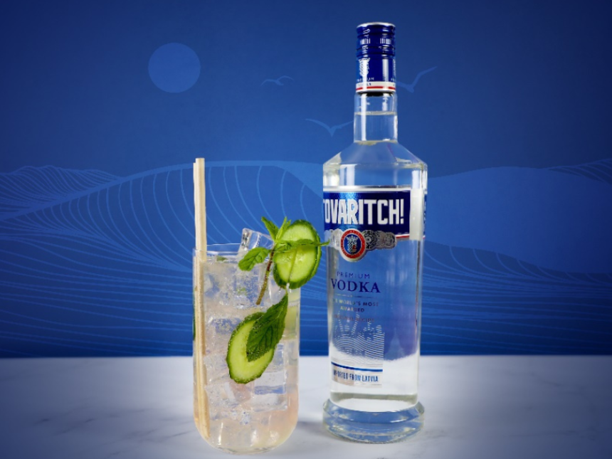 Bottle of Tovaritch Vodka with a long-serve drink