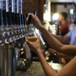 Bartender pouring a draught beer
