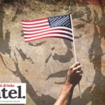 American flag against backdrop of mural of Donald Trump