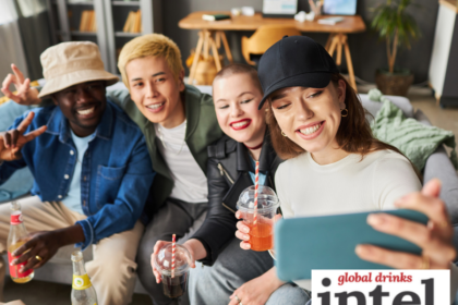Four younger LDA consumers posing for a selfie holding drinks