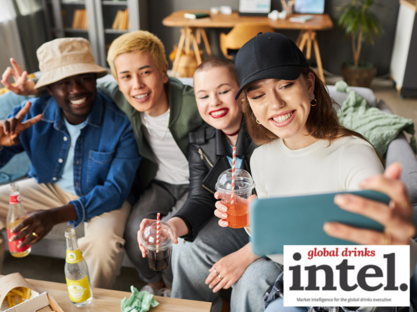 Four younger LDA consumers posing for a selfie holding drinks