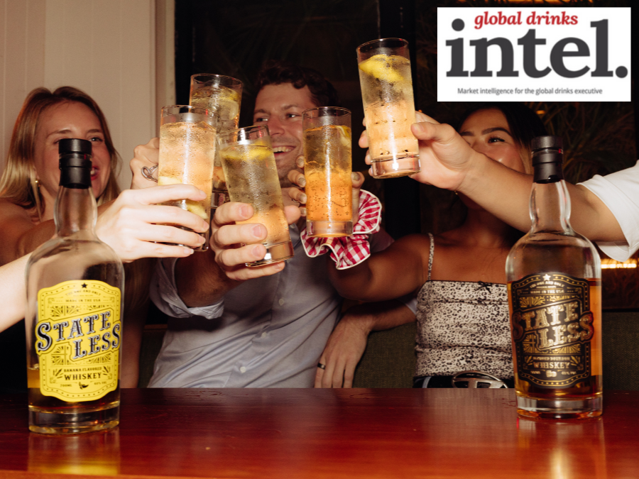 Drinkers with two bottles of Stateless American whiskey