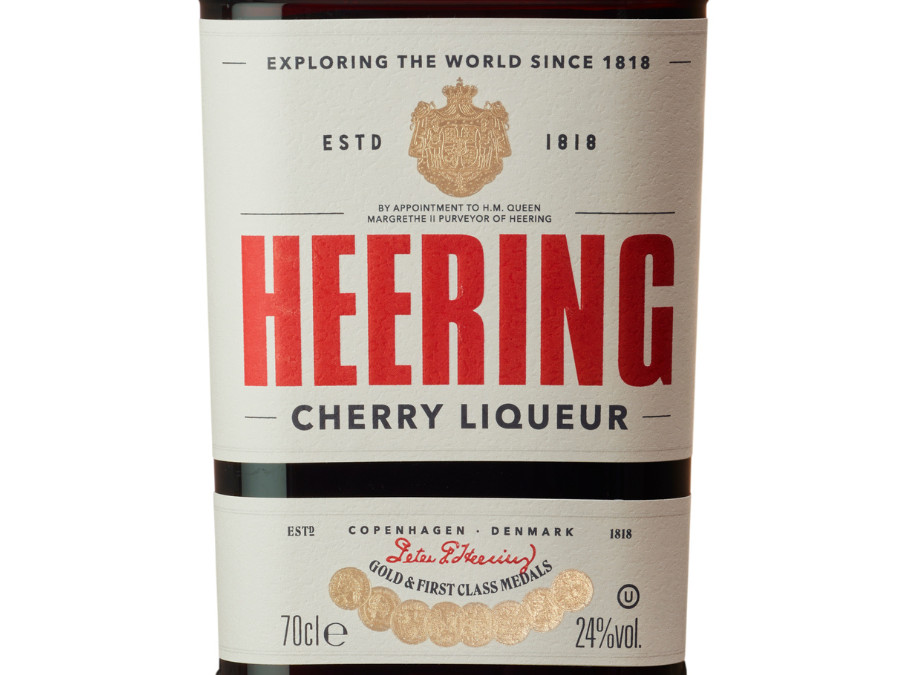 Close-up of Heering Cherry Liqueur bottle label