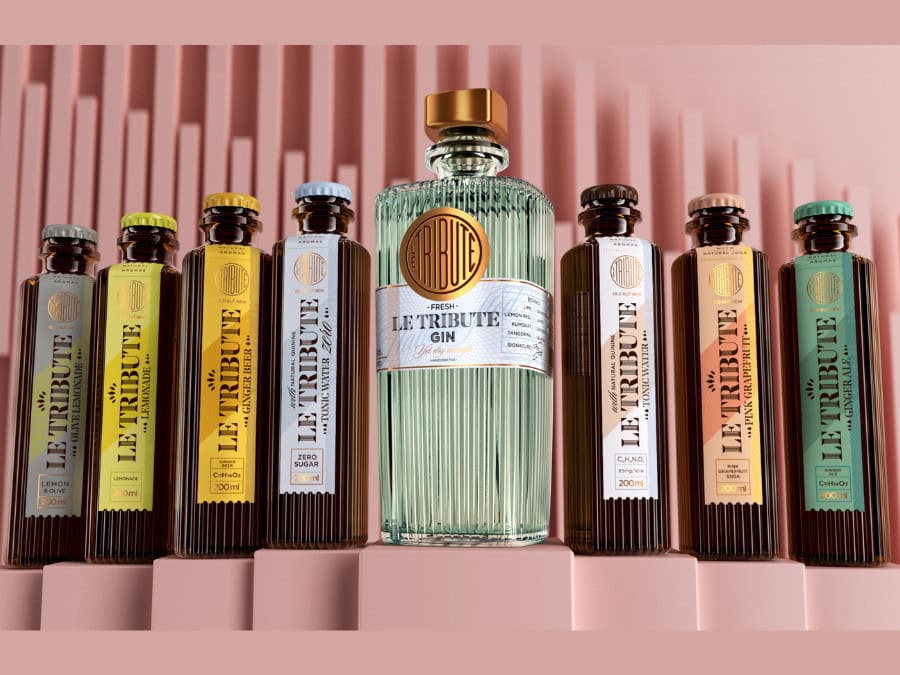 Bottle of Le Tribute gin with mixers