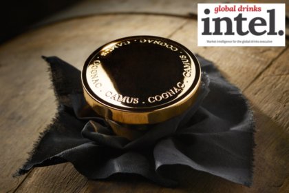 Gold Camus-branded stopper in a barrel