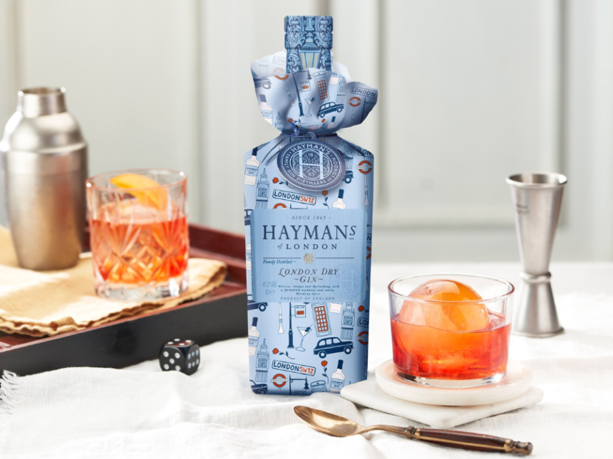 Wrapped bottle of Hayman's Gin with a negroni serve