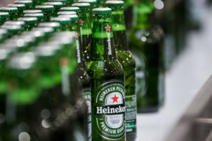 Bottles of Heineken on a production line