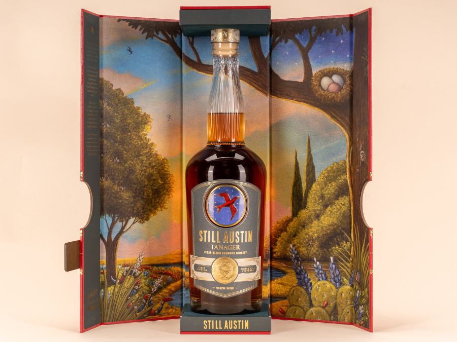 Bottle of and box for Still Austin Whiskey Co Tanager Cigar Blend Whiskey