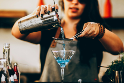 Bartender pouring a cocktail