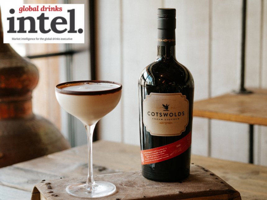 Bottle of Cotswolds Cream Liqueur with a flat white martini cocktail serve