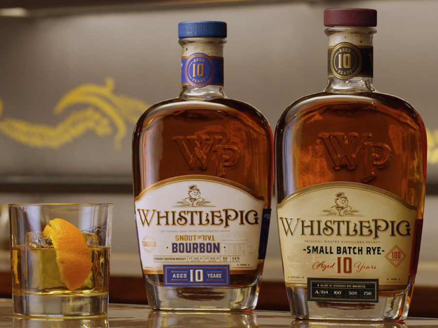 Bottle of Whistlepig Snout-to-Tail bourbon next to 10-Year-Old Rye