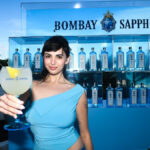 Rebecca Black with a branded Bombay Sapphire glass