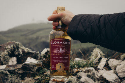 Clonakilty Irish whiskey bottle being held