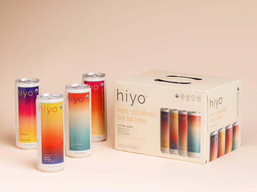 Four Hiyo cans next to box