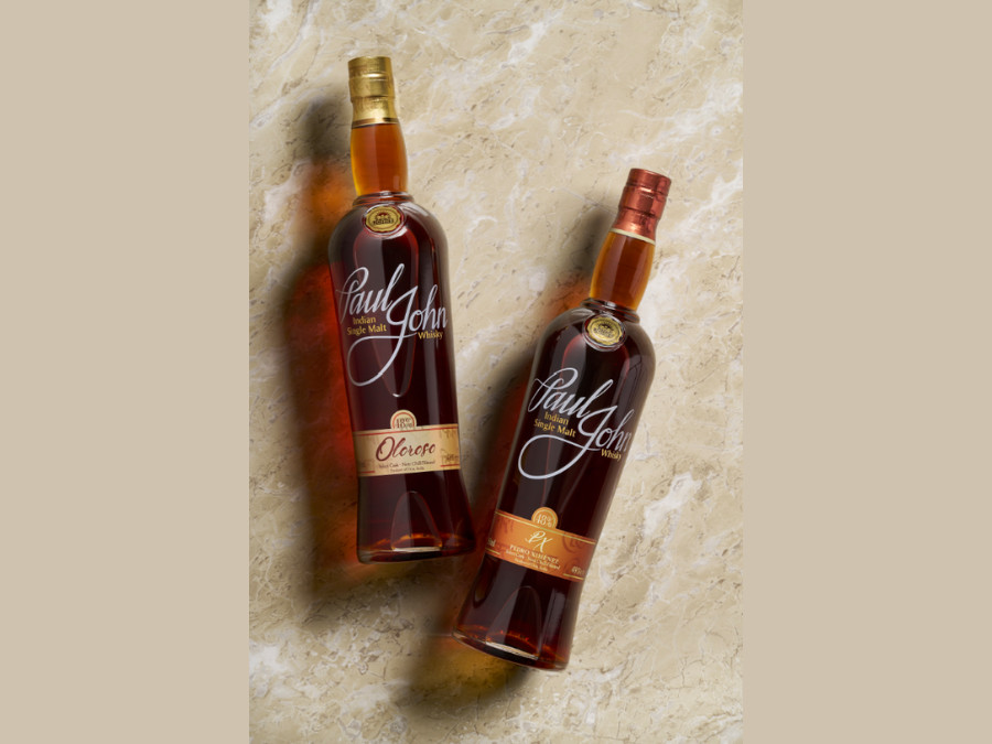 Paul John single malt whisky bottles