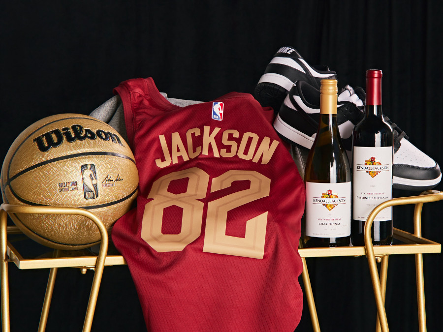 Gold basketball, basketball jersey with Jackson on the back and two bottles of Kendall-Jackson wine