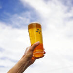 Branded glass of North Brewing beer