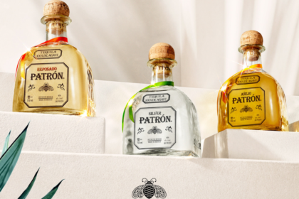 Three Patron tequila bottles on steps