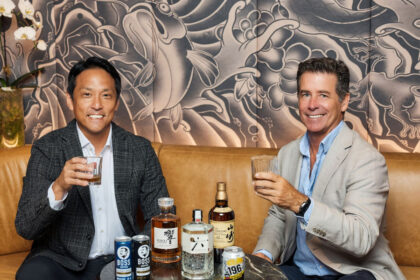 Incoming CEO Daisuke Minato next to departing CEO Darren Fullerton